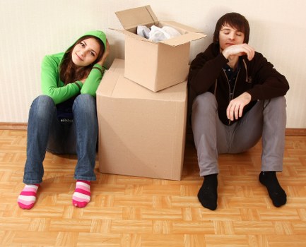 Moving team protecting property during a van loading process