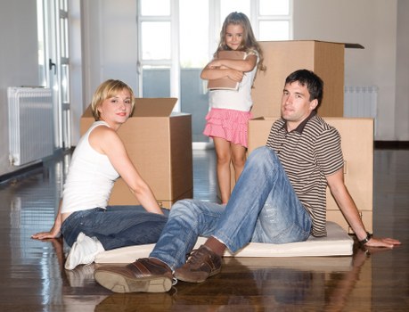 Loading household furniture into a removal truck in Maida Vale